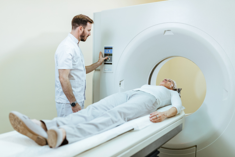 Patient Lying On A Ct Scanner During A Quick Non Invasive Calcium Score Heart Scan