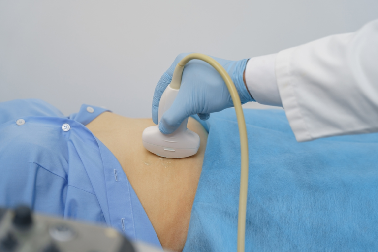 Sonographer Performing An Ultrasound Scan For A Patient At A Radiology Clinic In Albury